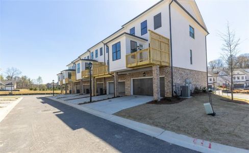 Back of the Glendale, 2 car garage and great area to enjoy the outdoors.  Picture NOT of actual home, but a representation of a previously built TPG property.