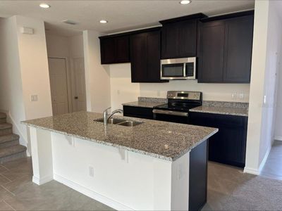 New construction Townhouse house 4840 Noble Cypress Street, Kissimmee, FL 34746 Powell- photo 4 4