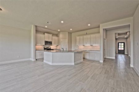 New construction Single-Family house 12019 Champions Forest Drive, Mont Belvieu, TX 77535 - photo 4 4