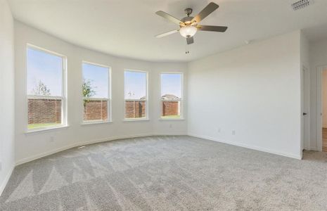 Elegant owner's suite with Bay window *real home pictured