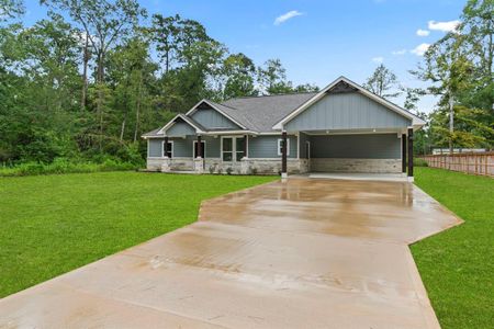 New construction Single-Family house 318 County Road 2221, Cleveland, TX 77327 - photo 1 1