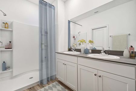 Casey Key new construction home plan owner's bathroom at Lanier Acres in Zephyrhills, FL by William Ryan Homes Tampa