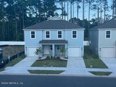 New construction Townhouse house 14998 Macadamia Lane, Unit 270, Jacksonville, FL 32218 - photo 0