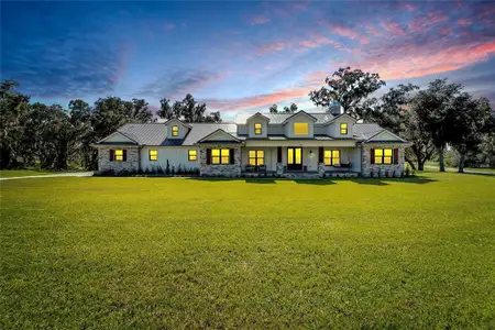 New construction Single-Family house 464 Long And Winding Road, Groveland, FL 34737 - photo 0