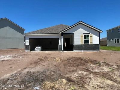 New construction Single-Family house 14595 Macadamia Lane, Unit 50, Jacksonville, FL 32218 - photo 1 1