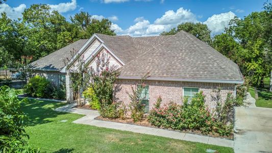 Landscaped with side entry garage and generous sidewalks