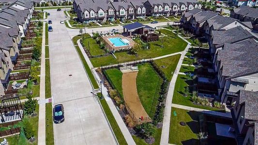 Aerial photo of community with pool and dog park