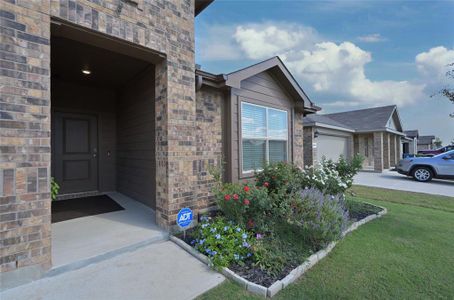 Nicely Landscaped Yard & covered front porch