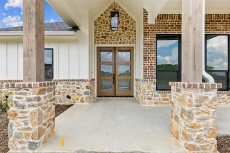 Property entrance with french doors