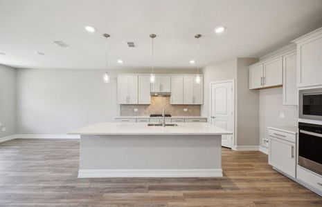 Bright kitchen with ample cabinet space*real home pictured