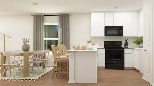 Kitchen featuring black appliances, white cabinets, and light wood-type flooring