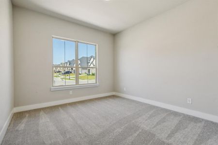 Spare room with carpet flooring