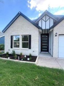 View of front of house with a front yard