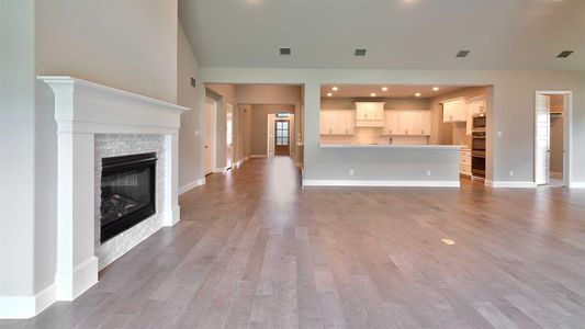 Unfurnished living room featuring light hardwood / wood-style flooring