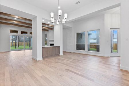 Formal Dining with Built in Cabinetry and Engineered Hardwood Flooring