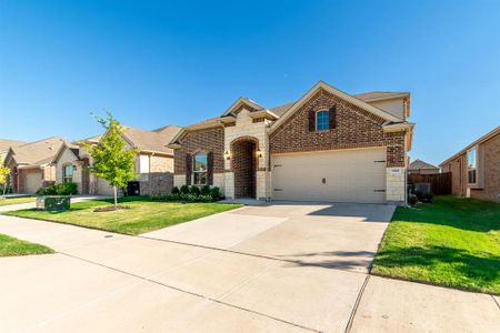 Lovely landscaping offers a taste of the beauty that awaits inside!