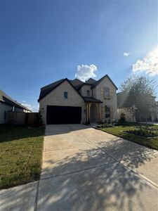 HOME IN PROGRESS - Stunning curb appeal welcomes you with and upgraded elevation and beautifully landscaped gardens!