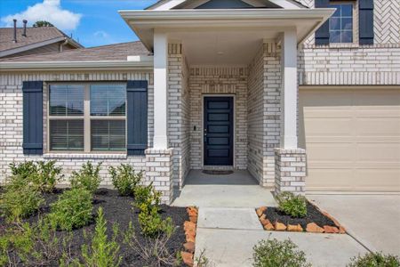 Door and shutters create a welcoming look to the home.