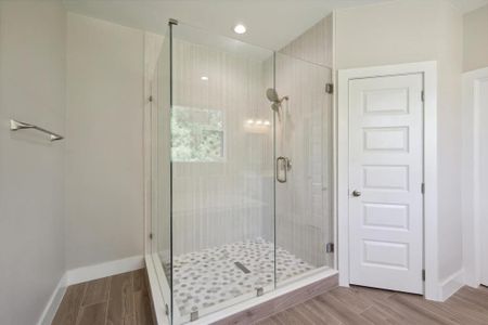 Beautiful custom shower with separate toilet area