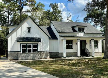 New construction Single-Family house 16 River Plantation Drive, Conroe, TX 77302 - photo 0