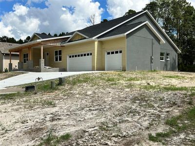 New construction Single-Family house 5268 Ravensbrook Court, Brooksville, FL 34601 - photo 1 1
