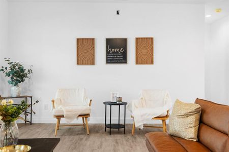 Living area featuring light hardwood / wood-style flooring