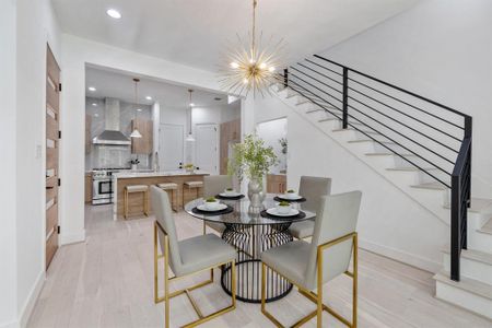 Beautiful dining area sits just between the kitchen and living for easy entertaining.