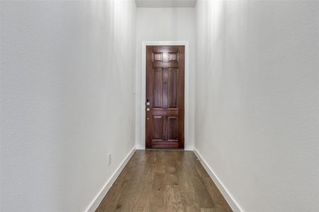 Hall featuring hardwood / wood-style flooring