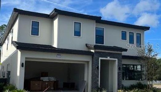 New construction Single-Family house 1318 Butterfly Orchid Road, Davenport, FL 33837 - photo 0