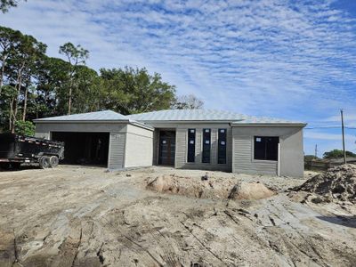 New construction Single-Family house 1199 Se Puritan Lane, Port Saint Lucie, FL 34983 - photo 0 0