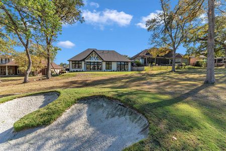 164 Somerton Dr with expansive views of the golf course green, and no back neighbors.