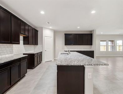 This Gourmet Kitchen will have the Ultra-Modern Tall White Shaker Cabinets, Stunning Silestone Quartz Counters, and Stainless Steel Whirlpool Appliances!  **Image representative of plan only and may vary as built**NEW Photos coming soon!