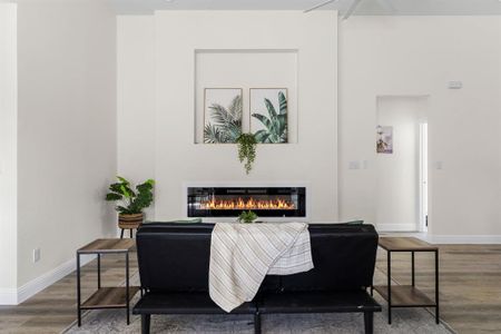 Living room with hardwood / wood-style floors