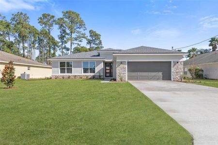 New construction Single-Family house 5 Birchwood Drive, Palm Coast, FL 32137 Heron- photo 0
