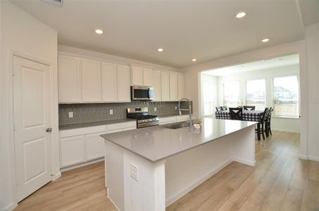 Featuring open design, kitchen opening up to breakfast nook