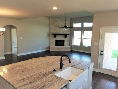 Luxury kitchen opens to family room & eating area.