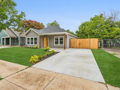 Single story home with a front yard