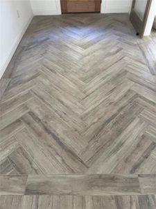 Entry with herringbone floors