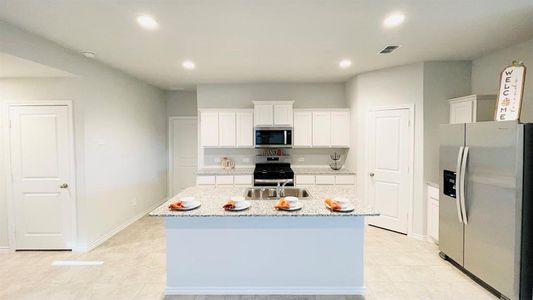 Kitchen - All Home and community information, including pricing, included features, terms, availability and amenities, are subject to change at any time without notice or obligation. All Drawings, pictures, photographs, video, square footages, floor plans, elevations, features, colors and sizes are approximate for illustration purposes only and will vary from the homes as built.