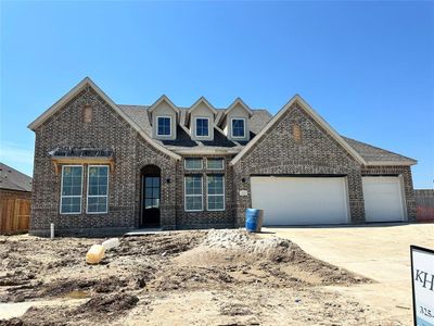 One-story home with 4 bedrooms, 3.5 baths and 4 car tandem garage