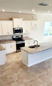 New construction Single-Family house 148 Krenson Bay Loop, Winter Haven, FL 33881 2202-- photo 42 42