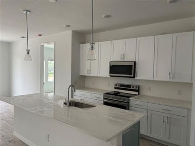 New construction Single-Family house 1400 Sterling Pointe Drive, Deltona, FL 32725 Badland Homeplan- photo 4 4