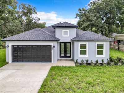 New construction Single-Family house 909 N Lake Pleasant Road, Apopka, FL 32712 - photo 0