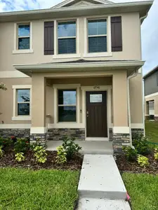 New construction Townhouse house 1756 Red Canyon Drive, Kissimmee, FL 34744 - photo 0