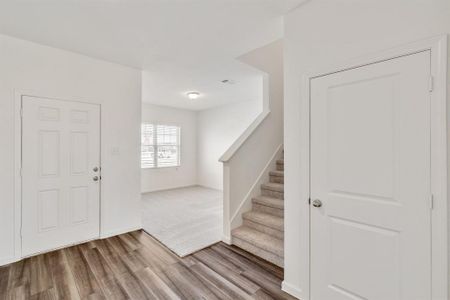 Entryway featuring hardwood / wood-style floors