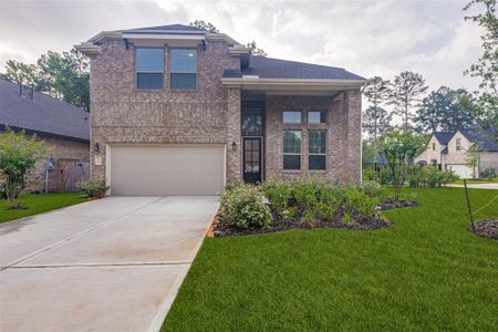 New construction Single-Family house 604 Spotted Sunfish Drive, Conroe, TX 77318 - photo 1 1
