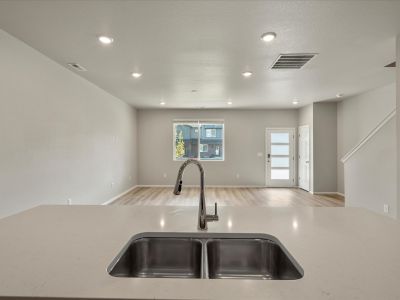 New construction Multi-Family house 22211 East 7Th Pl, Aurora, CO 80018 The Orchard- photo 1