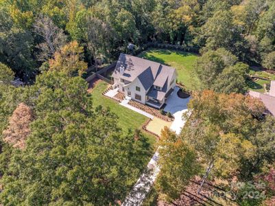 Stately curb appeal and privacy in the middle of Charlotte.