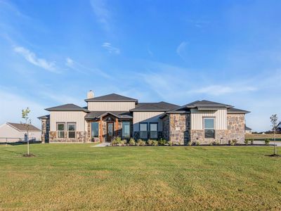 View of front of property with a front lawn