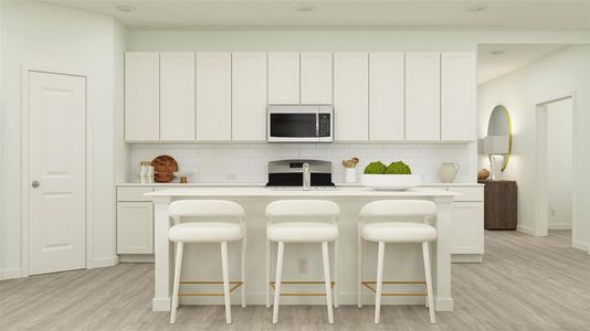 Kitchen featuring white cabinetry, backsplash, stove, and light wood-type flooring